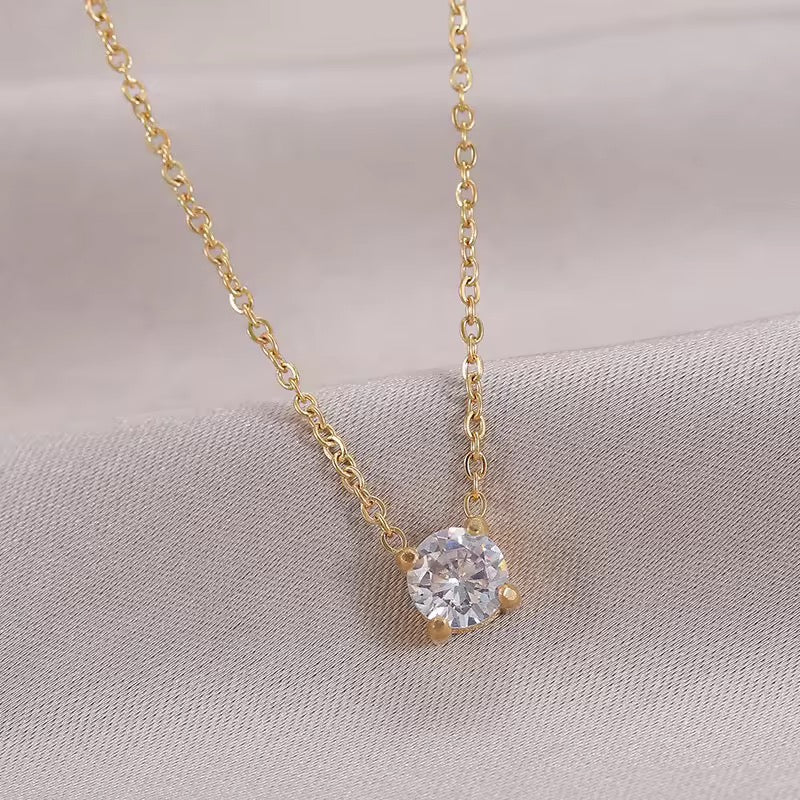 Celeste Solitaire Drop Necklace – Gold (Delicate round-cut crystal pendant)