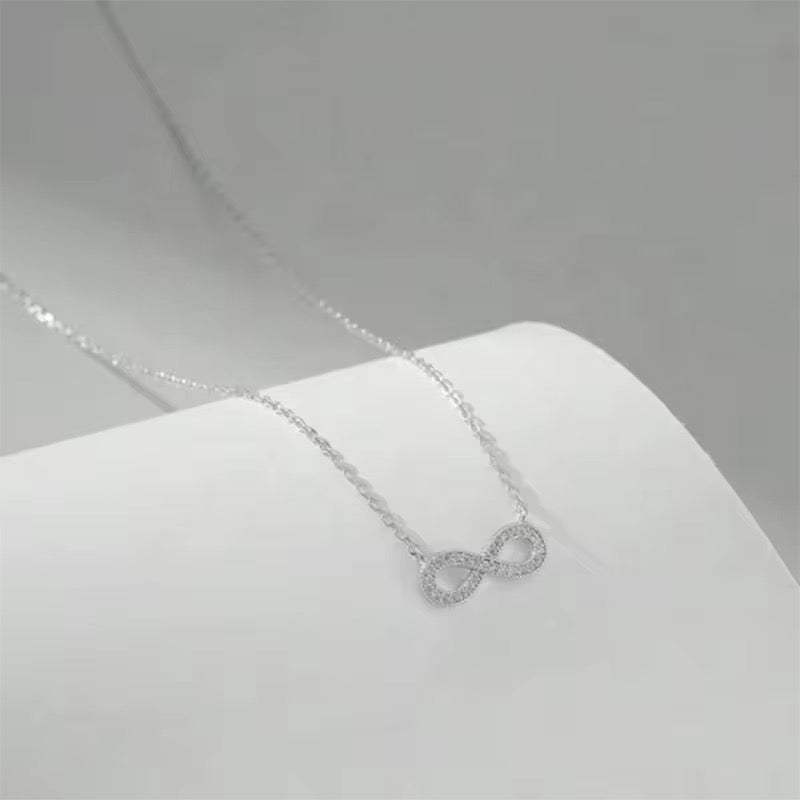 Eternal Spark Infinity Necklace – Silver (Minimal crystal infinity pendant chain)